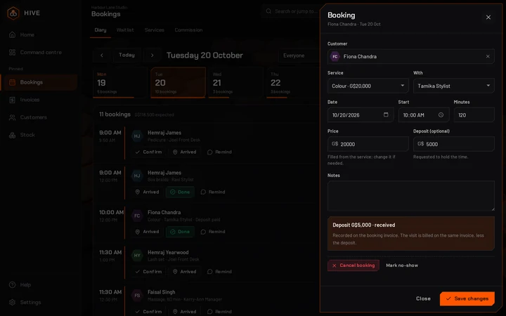 A colour booking with a G$5,000 deposit marked as received and recorded on the booking invoice